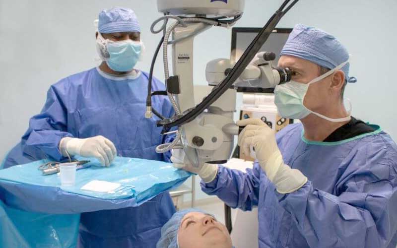 Quigley Eye Specialists physician examining a patient's eyes