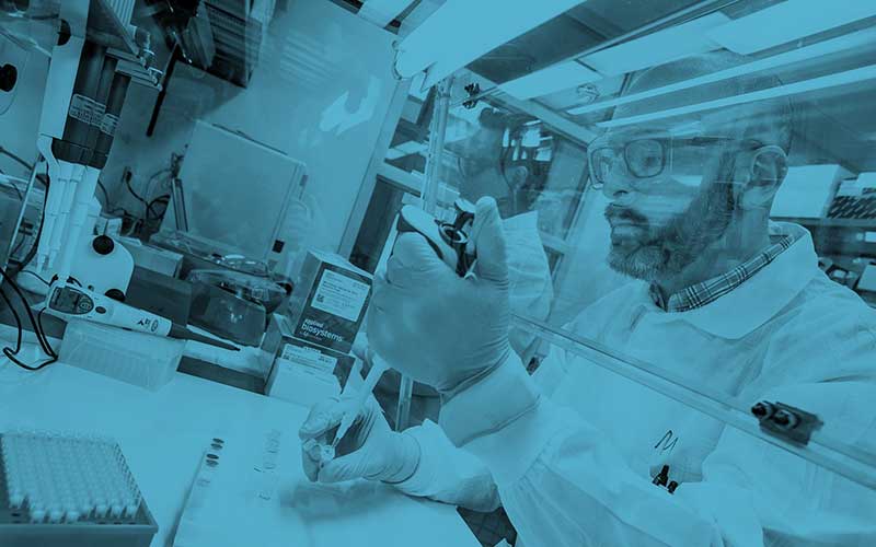 Quigley Eye Specialists physician in lab